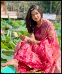 Tanjin Tisha in red sari